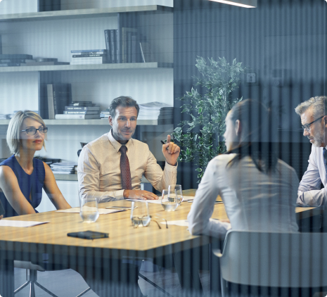 AdQualis Team in a meeting table